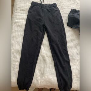 On sweatpants, never worn, size xs